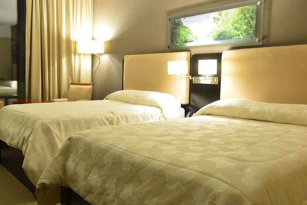 Howard Johnson Plaza Resort Luján Pokoj fotografie