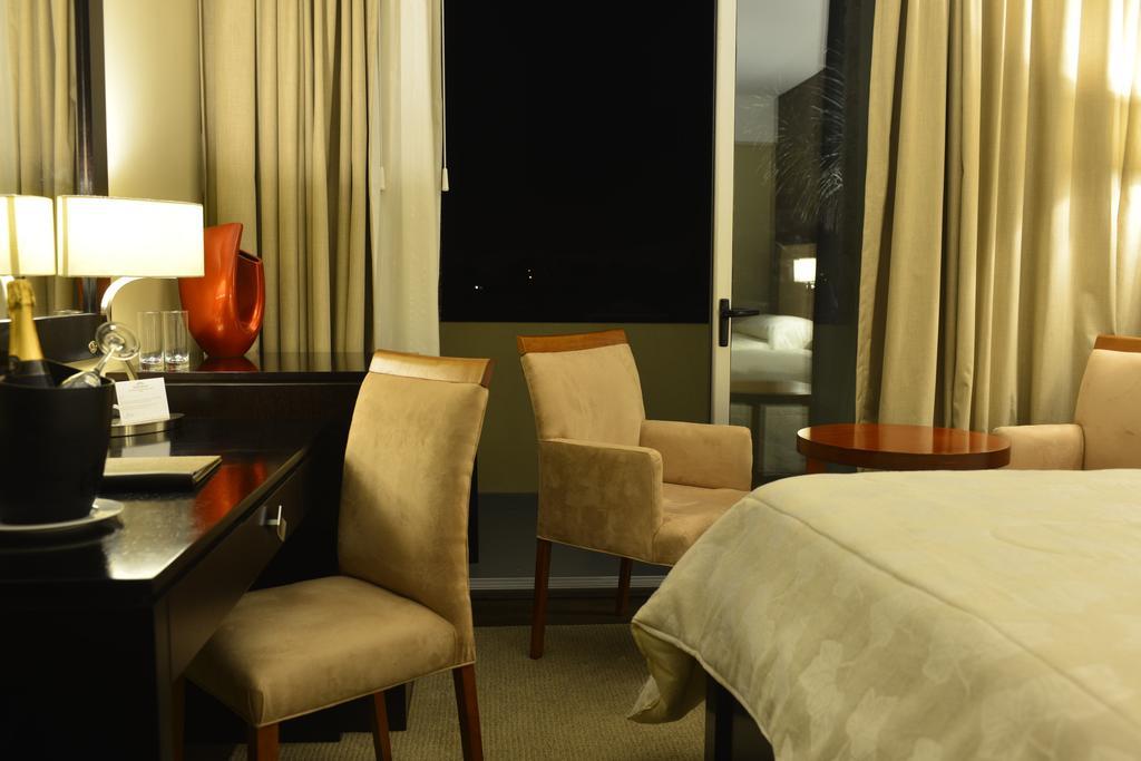 Howard Johnson Plaza Resort Luján Pokoj fotografie