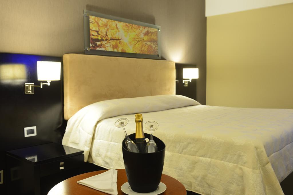 Howard Johnson Plaza Resort Luján Pokoj fotografie